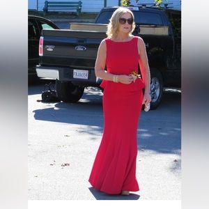 Beautiful red BCBGMaxazria full length dress with cascading hem.